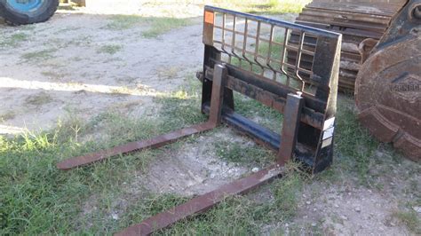 ebay motors skid steer attachments|used cat attachments for sale.